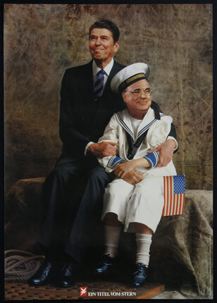 a man in a suit and tie sitting next to a man in a sailor suit