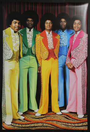 a group of men wearing colorful outfits