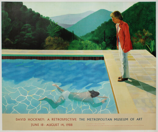 a man standing next to a pool