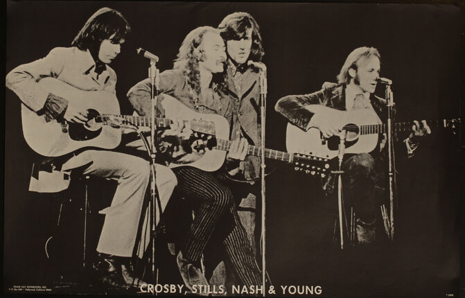 a group of men playing guitars