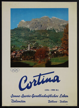 Italian travel poster with a small town at the foot of a large mountain 