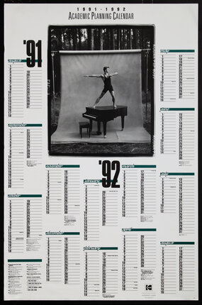 calendar with a photo of a male dancer standing on a grand piano