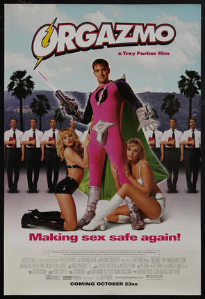 movie poster of a superhero in a flamboyant suit standing holding a flame gun with two sexy women holding his legs and a row of mormons and hills in the background