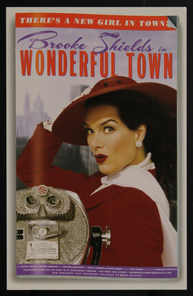 Poster with a woman holding her hat.