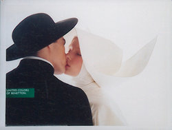 a man and woman kissing