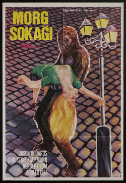 movie poster with an ape-man carrying away a collapsed woman