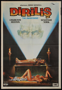 a movie poster with a nude woman lying under a sarcophagus flanked by torches and a pair of zombie eyes in a light beam emanating from the sarcophagus